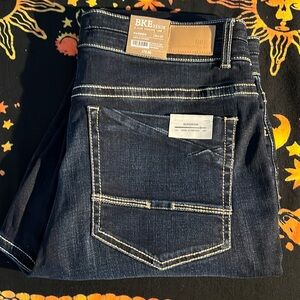 BKE denim by Buckle cropped jean distressed hems size 34x27 high rise stretch